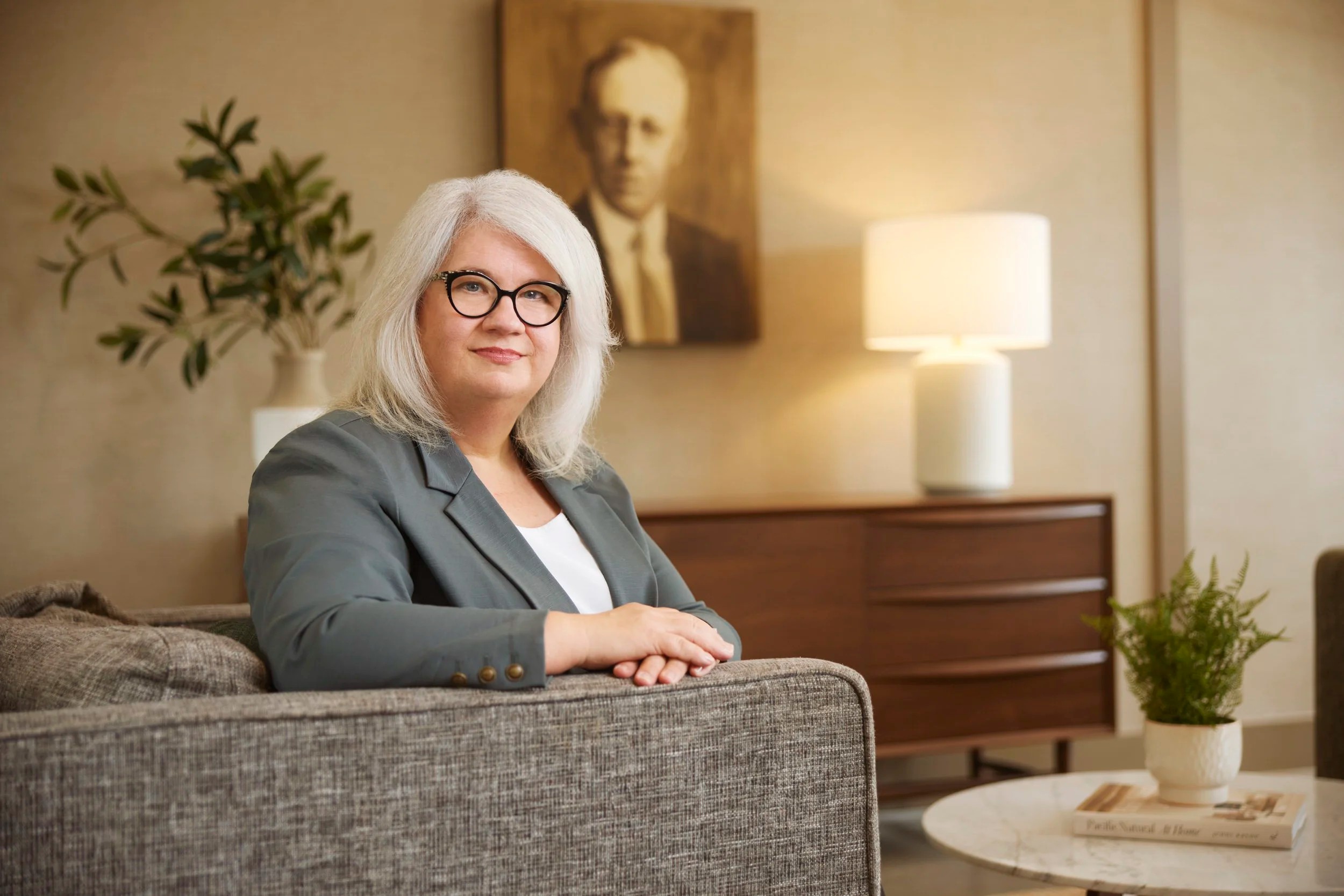 Office portrait on a sofa in a wealth management office, Edmonton
