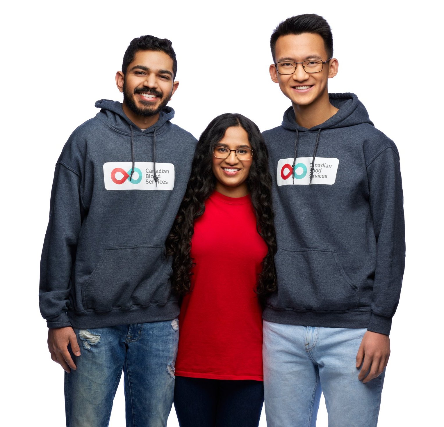 Three people together in branded hoodies