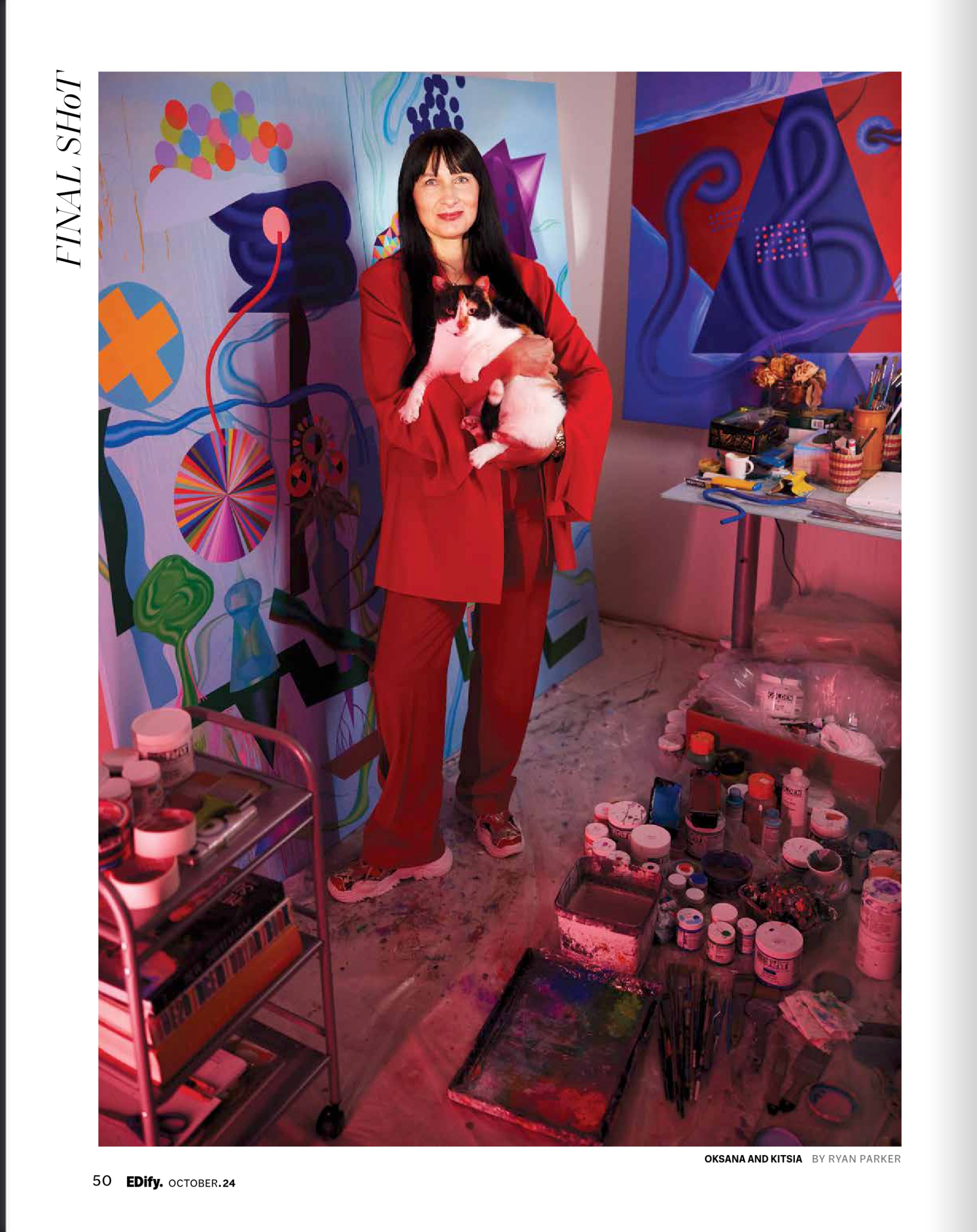 Final Shot: Oksana Movchan in her studio, holding Kitsia