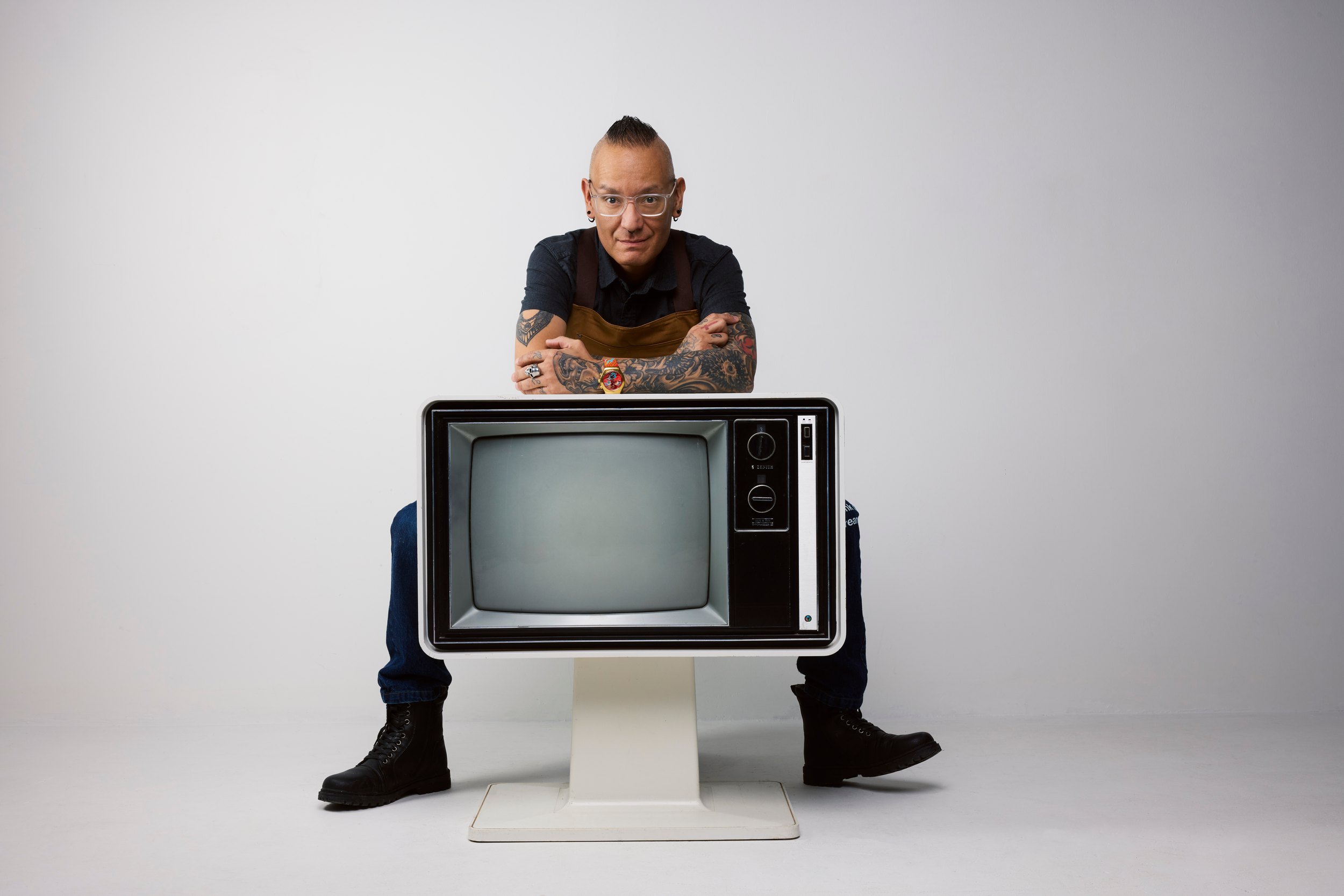 A closer portrait against the studio grey