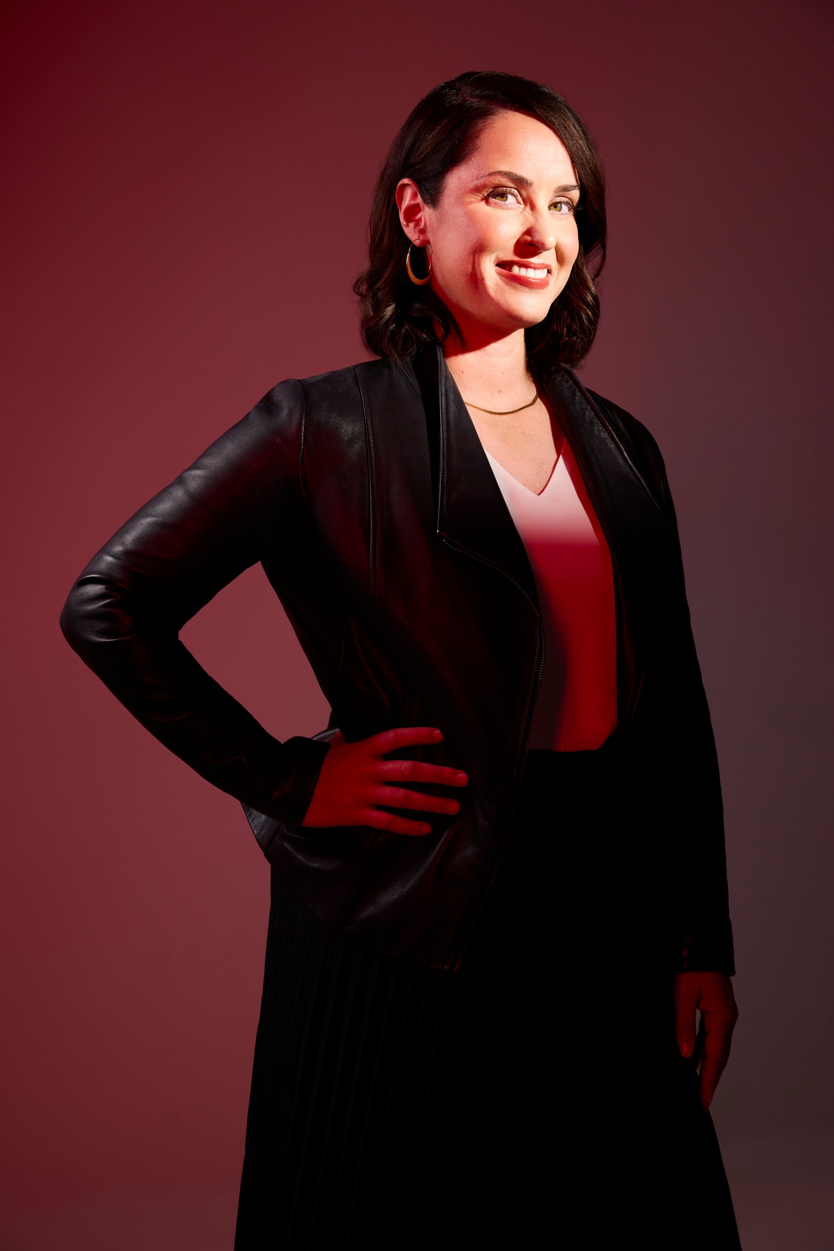 Sandra Stabel turned to the light, against the same crimson