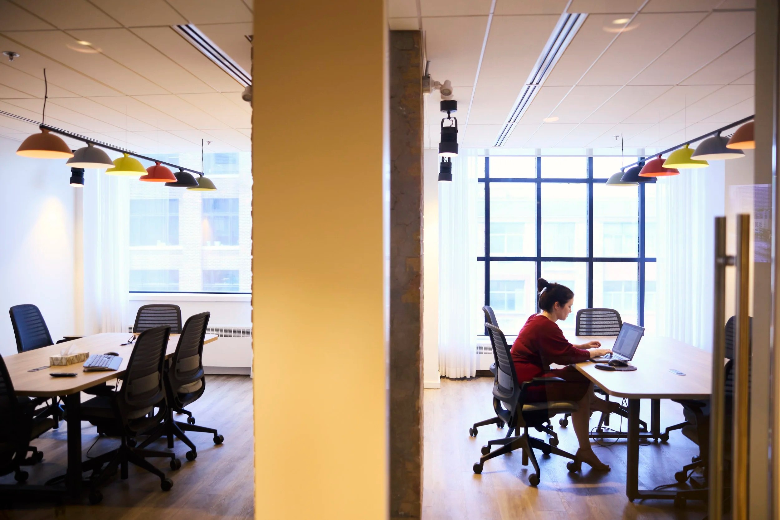 One person at work in a bright room, Toronto