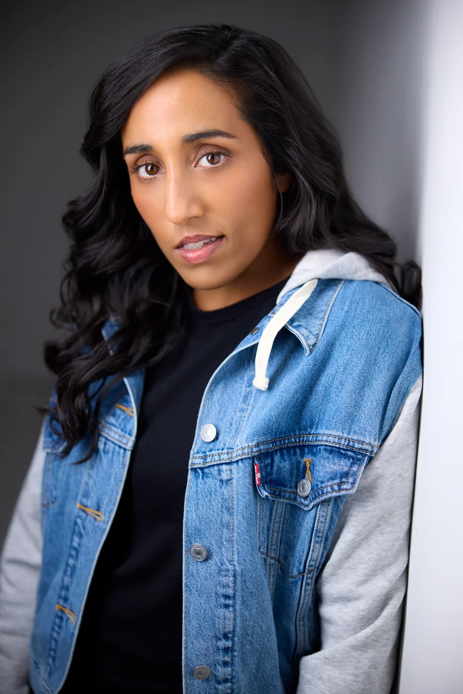 Ashley John in a denim jacket, actor headshot, Edmonton