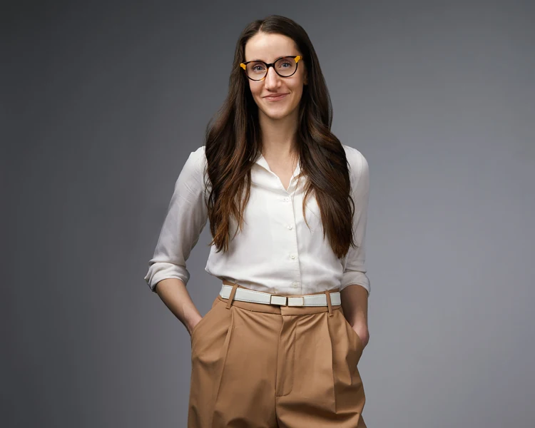 The same session, standing, white shirt on grey