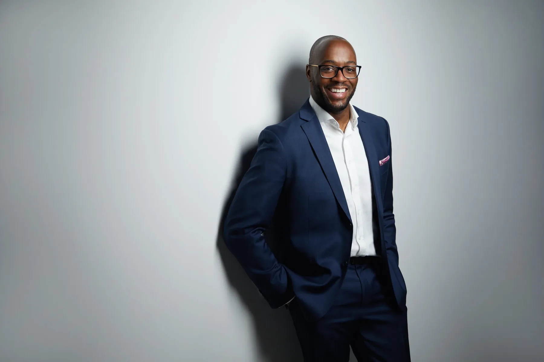 Business portrait against a white wall, Edmonton studio