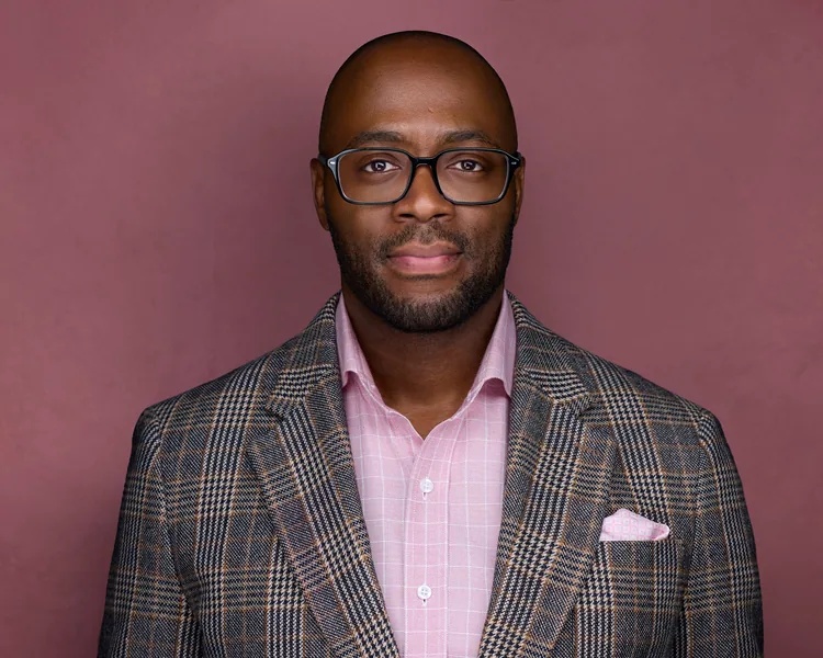 A plaid jacket on a mauve background, same session