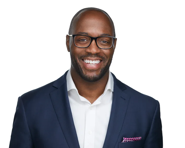 The same headshot on a white background