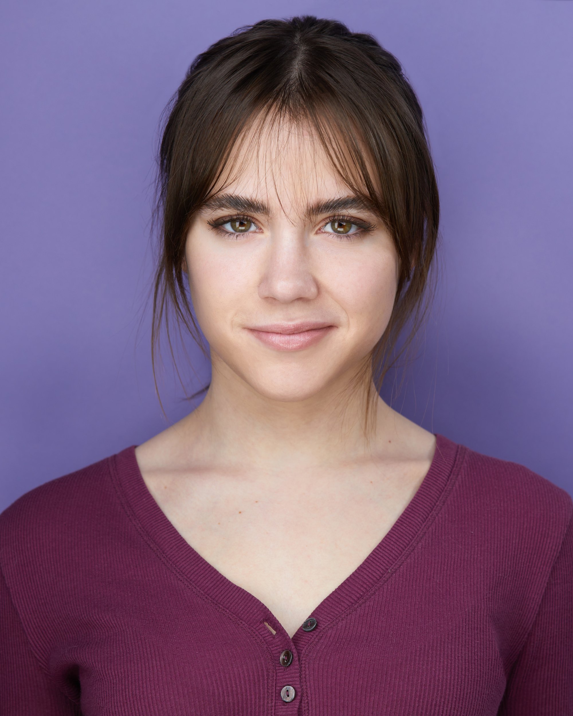 Kids and teens headshot: a plum henley against lilac