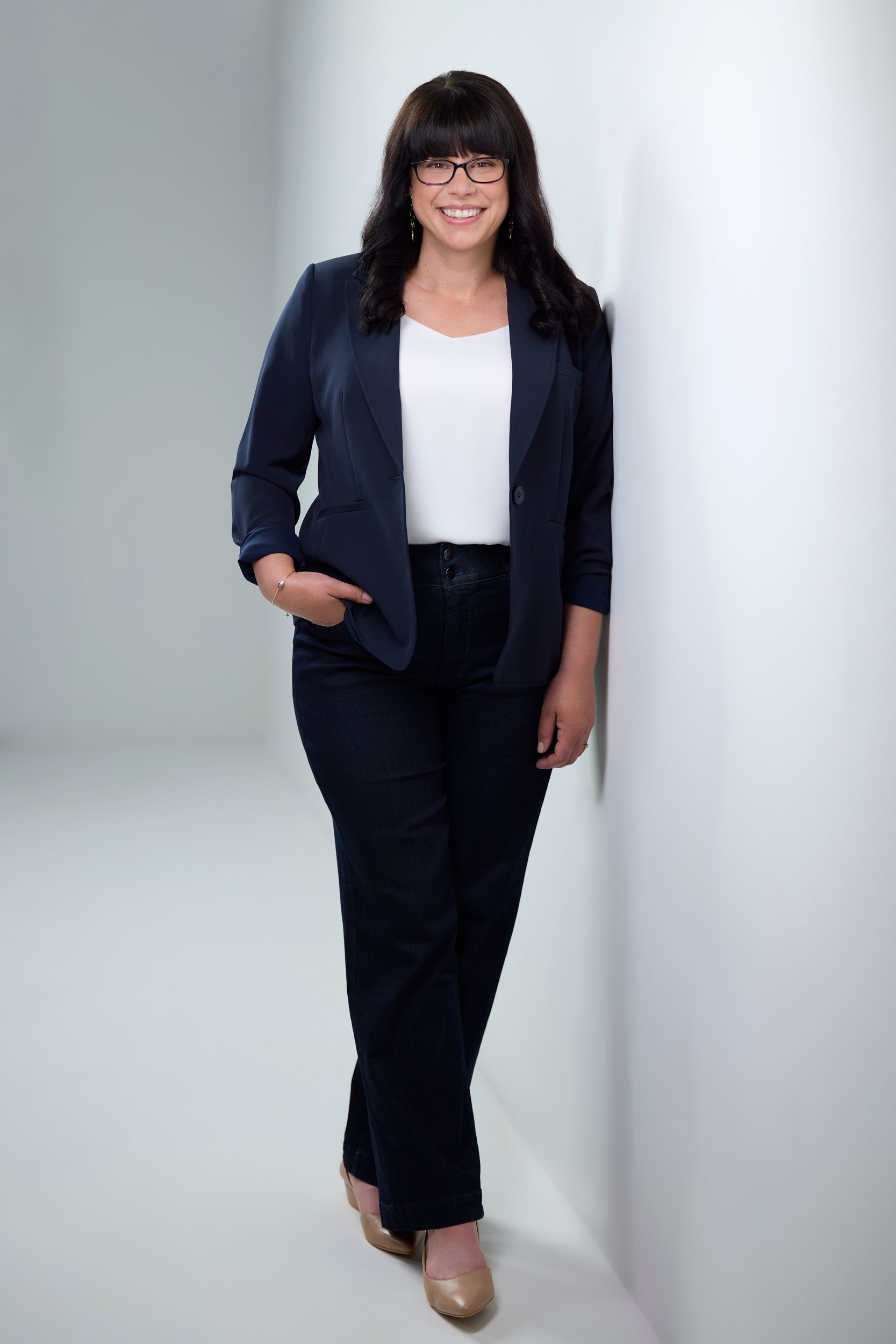 A navy blazer, full length