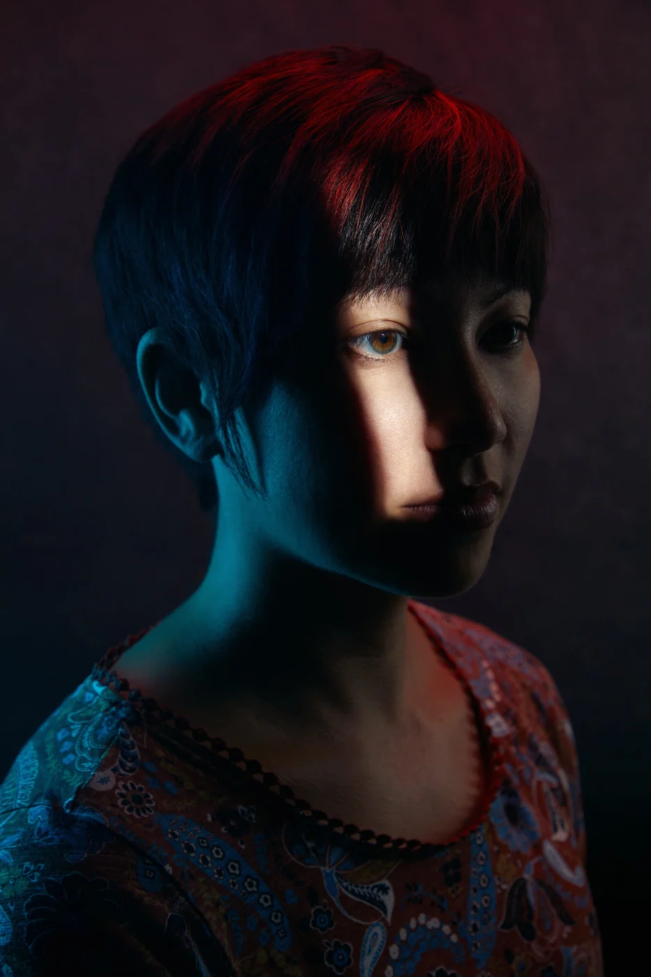 Portrait from Ryan Parker’s Slice of Light series — a single slice of light across the face, Edmonton