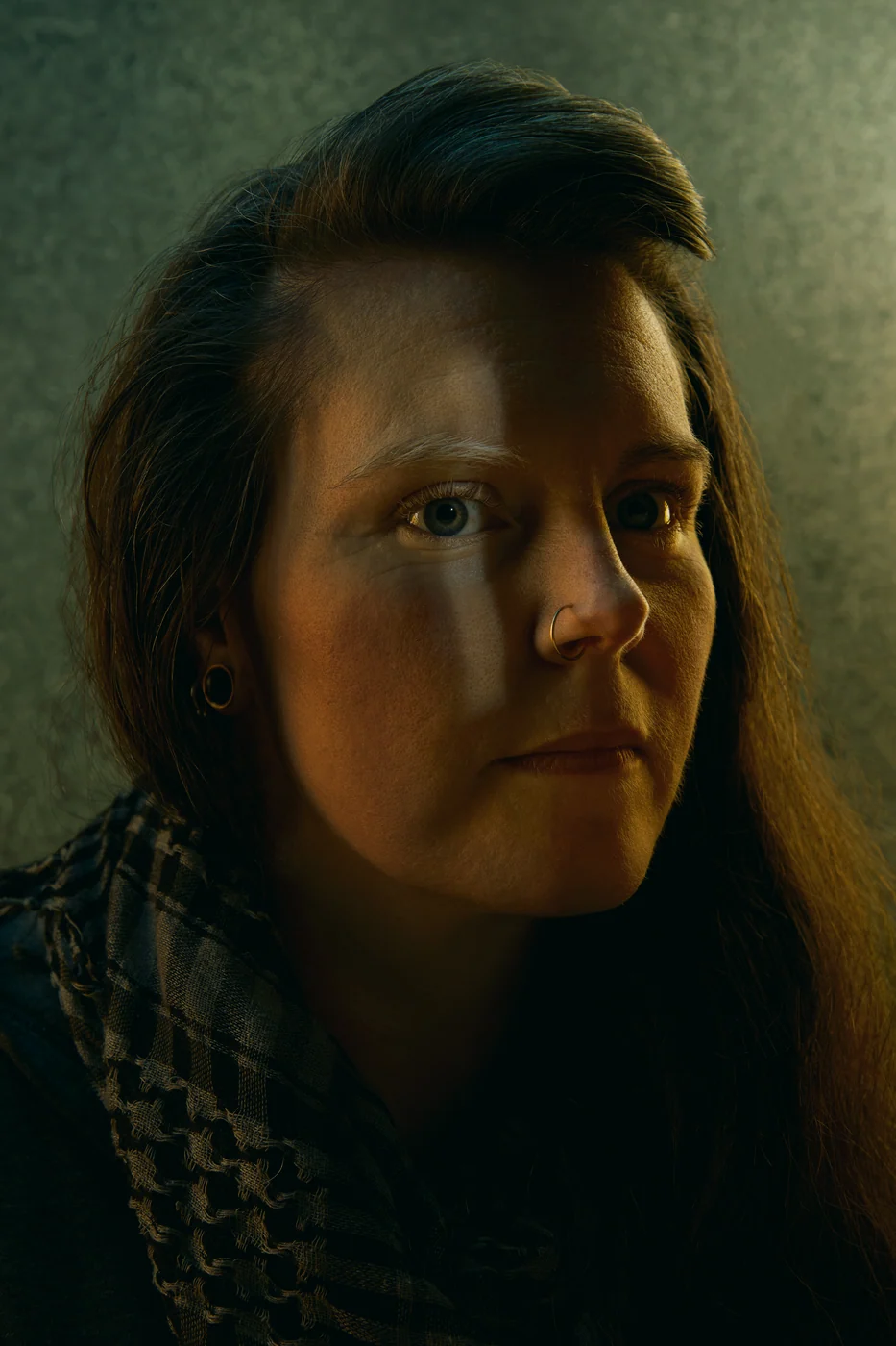 Portrait from Ryan Parker’s Slice of Light series — a single slice of light across the face, Edmonton