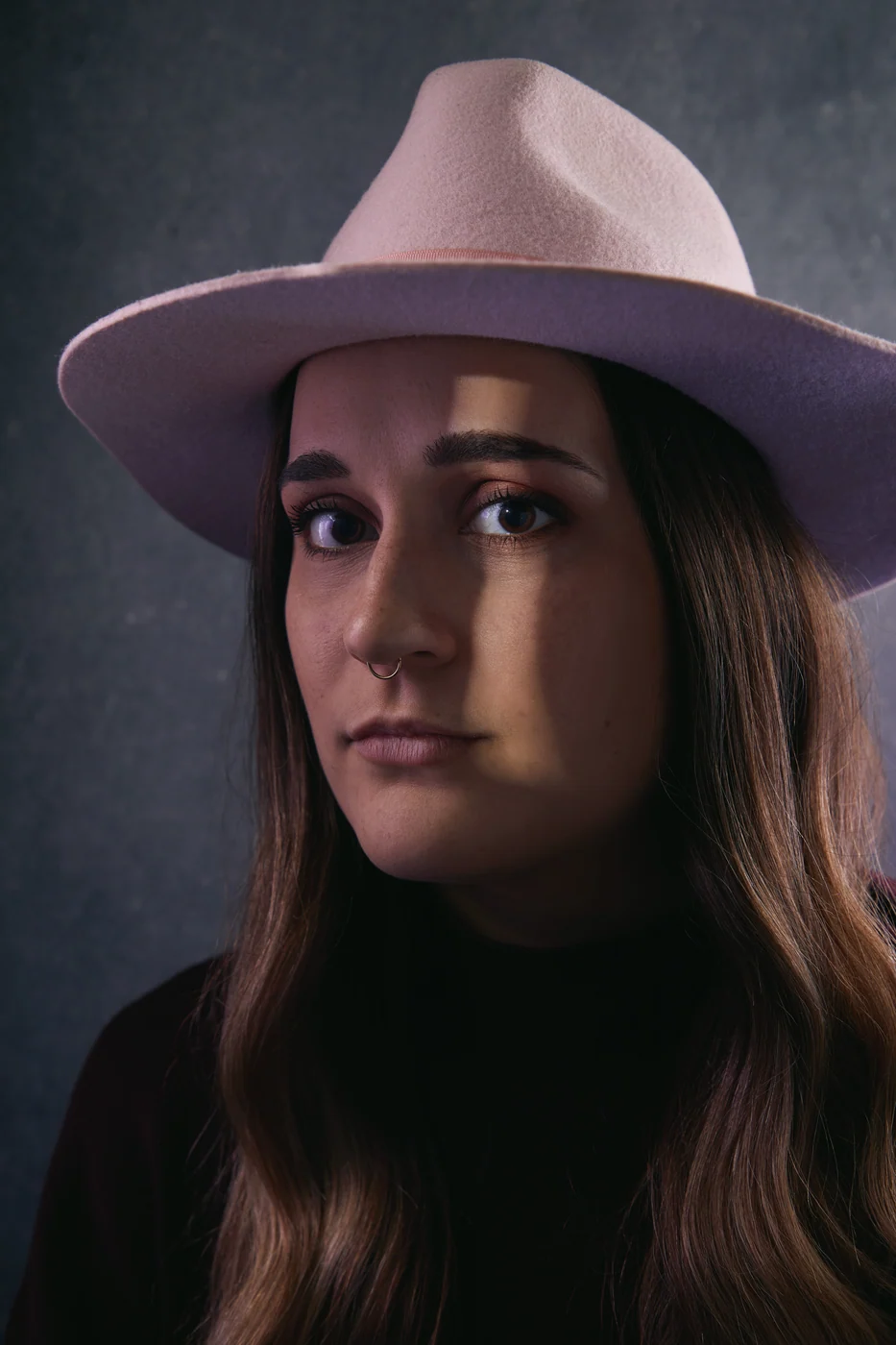 Portrait from Ryan Parker’s Slice of Light series — a single slice of light across the face, Edmonton