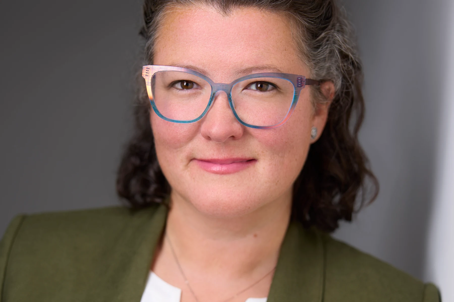 Tracy Howlett in rose frames, Edmonton studio