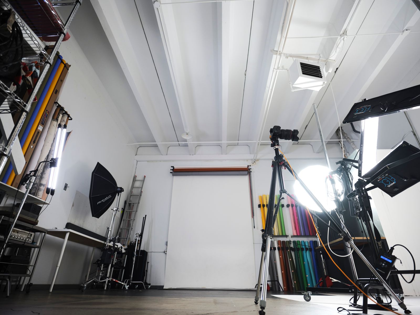 Inside the shooting space — lights, stands and the paper backdrops