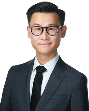 The same kind of headshot cropped tall for a company team page